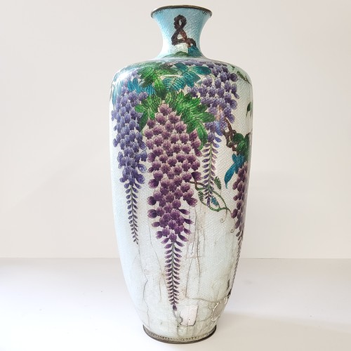 31 - A large Cloisonné vase decorated with irridescant Wysteria on a silver ground. (AF)