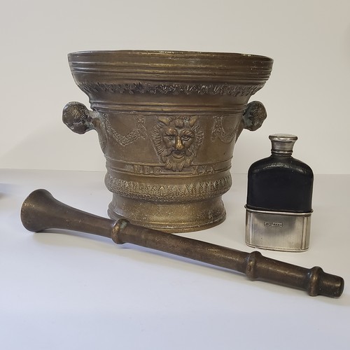 71 - A substantial 17th century style continental bronze pestle & mortar, the mortar of flared circul... 