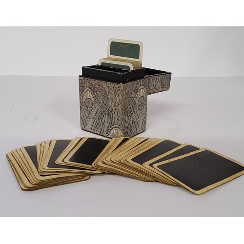 81 - A Liberty of London playing card case containing two sets of playing cards