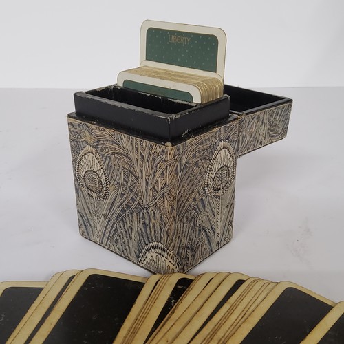 81 - A Liberty of London playing card case containing two sets of playing cards