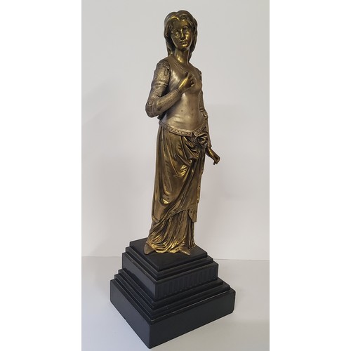 137 - A French bronze figure of a classical maiden, raised on a stepped black marble base, 50cms high