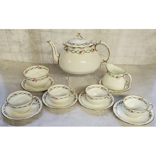 151 - A 1920's Royal Crown Derby part tea service for four, handpainted  with a green ribbon & pi... 