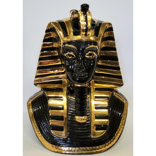 171 - A large ceramic Tutankhamun pharaoh mask, moorish black and gold glaze, 34cm high