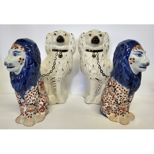 174 - A pair of early 20th century Imari pattern temple / mantel lions; a pair of large Victorian Stafford... 