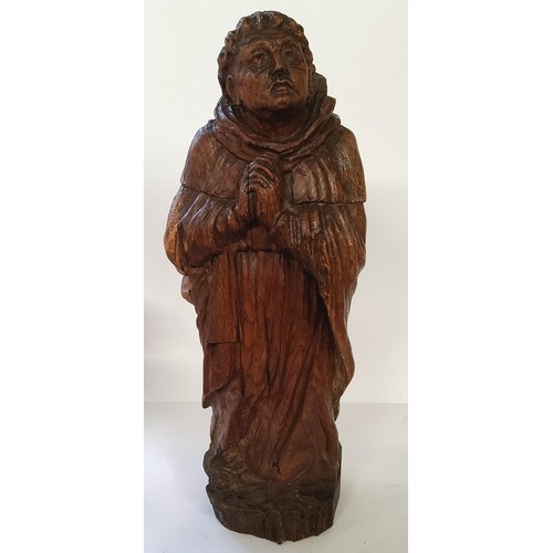 79 - A substantial 18th century Italian carved wood Saint Santos / monk figure, he stands dressed in trad... 