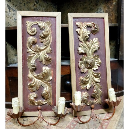 136 - A pair of 18th century carved giltwood and gesso girandole wall sconces, later oak frames. c.1780.