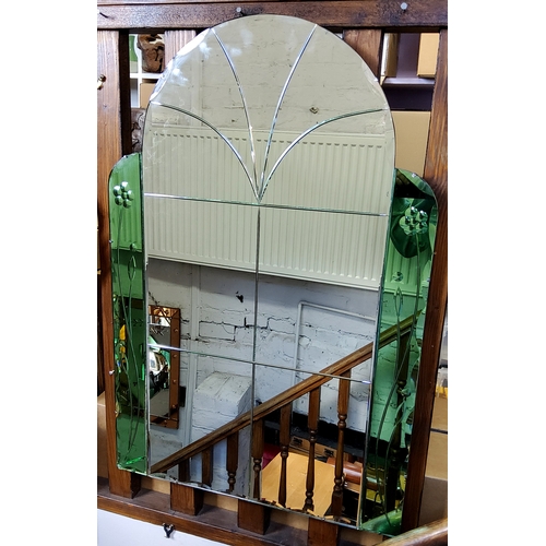 8 - A substantial Art Deco arch shaped mirror, emerald green glass panels to sides, c.1930