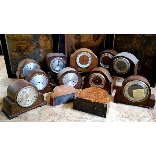 28 - Twelve early 20th century oak, walnut and mahogany mantel clocks (for restoration)