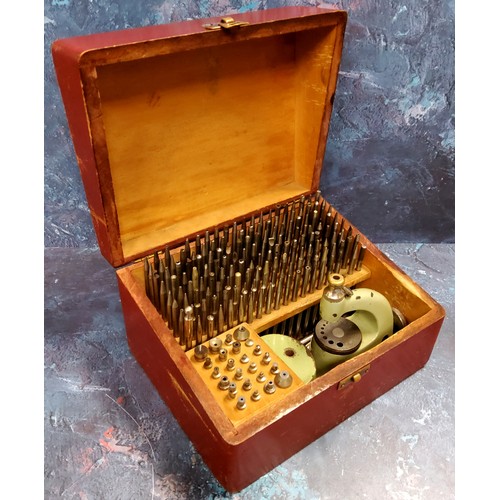 61 - Watch Maker's & Jeweller's Tools - An early Swiss 'FAVORITE GB' pusher press, with comprehensive... 