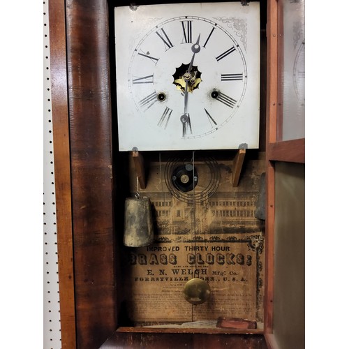 75 - An American mahogany wall clock, manufacturer label to interior 'Improved Thirty Hour Brass Clocks; ... 