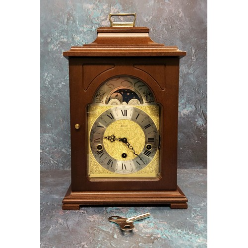 93 - A Hermle mahogany mantel clock, 8-day 4/4 Westminster striking mechanism with automatic night s... 