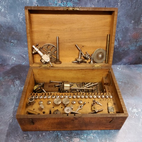 126 - A 19th century Lorch, Schmidt & Co' type watchmaker's lathe accessories in box