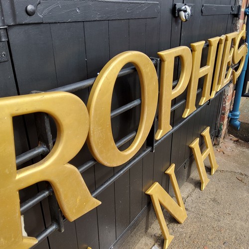 142 - Advertisement & Signage - eleven 20th century gilded shop front letters, each measures 38cm high... 