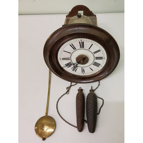 161 - A German wall clock, Roman numerals, striking on bell, c.1890;  an early 20th cuckcoo clock;&nb... 