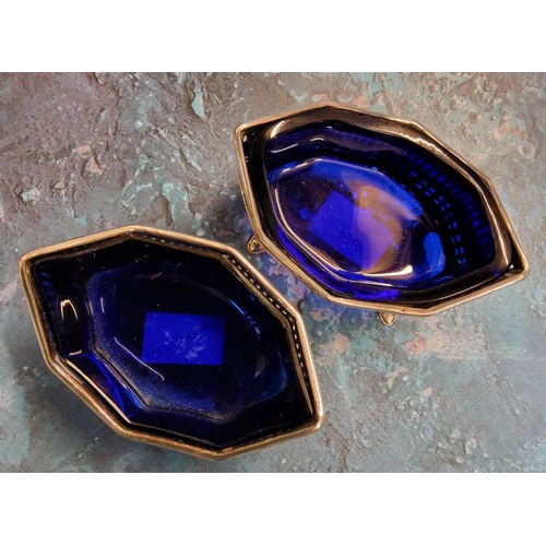 190 - A pair of Victorian Sheffield Plate octagonal salts, pierced sides, blue glass liners, 9cm wide, c.1... 