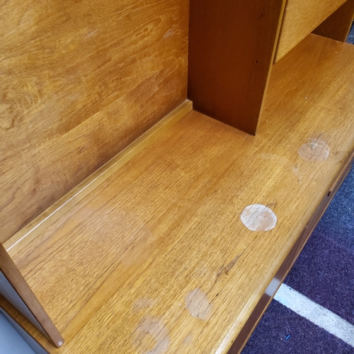 477 - A Mid 20th century teak sideboard unit.