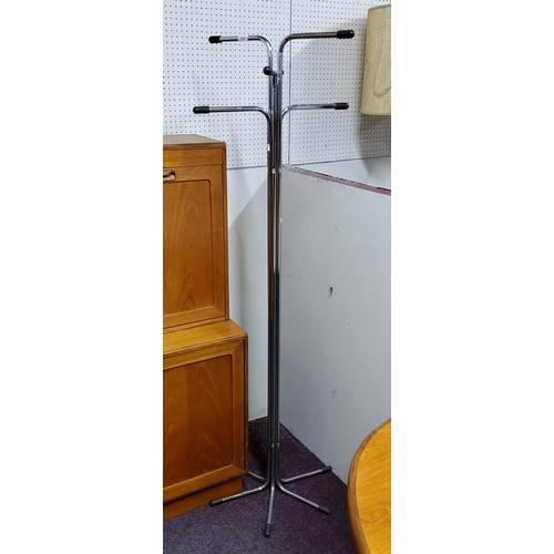 480 - Mid 20th Century Design - a chrome six section coat rack, approximately 5ft tall