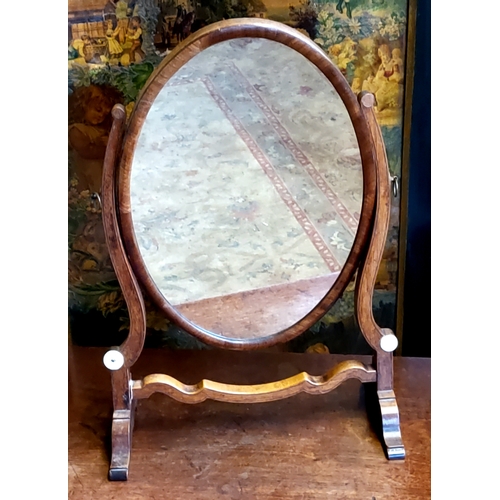 498 - A George III oval dressing table mirror c.1800, Scandinavian pine back panel with flamed mahogany cr... 