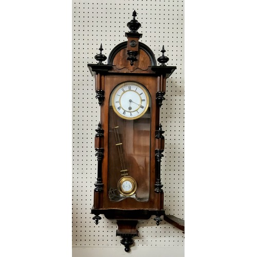 50A - A 19th century walnut and ebony Vienna clock c.1880