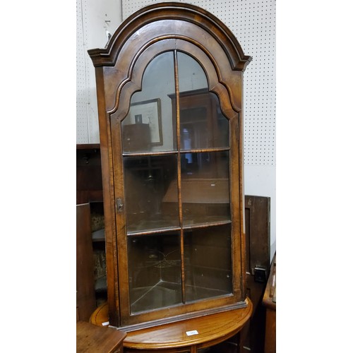 492 - A Queen Anne Revival walnut corner cupboard. With key, excellent condition.