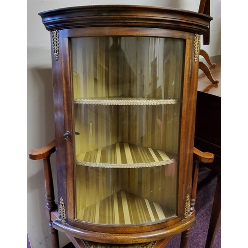 500 - A small mahogany and gilt metal mounted bow front corner cupboard, excellent condition.