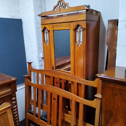 501 - An Art Nouveau satinwood bedroom suite comprising of a dressing chest, single wardrobe and bed (3) S... 