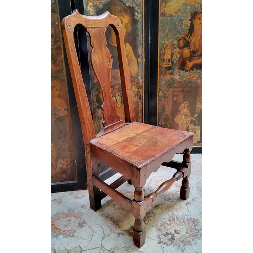 10 - An early 18th century Queen Anne oak side chair, pierced vasular splat, solid seat, turned stretcher... 