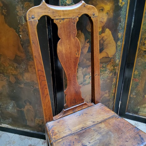 10 - An early 18th century Queen Anne oak side chair, pierced vasular splat, solid seat, turned stretcher... 