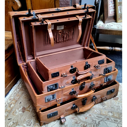 15 - Vintage Luggage - a matching graduated set of Giovanni leather suitcases; another larger leather sui... 