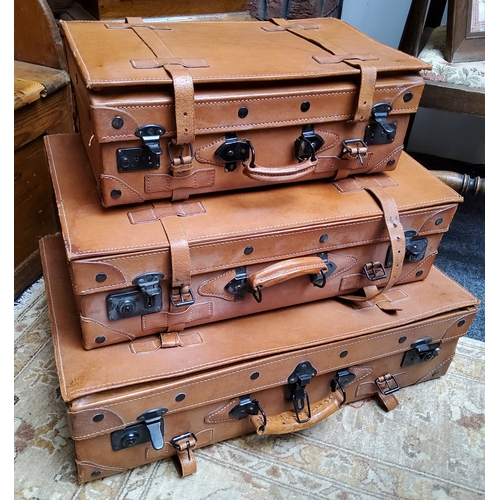 15 - Vintage Luggage - a matching graduated set of Giovanni leather suitcases; another larger leather sui... 