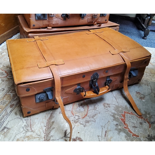 15 - Vintage Luggage - a matching graduated set of Giovanni leather suitcases; another larger leather sui... 