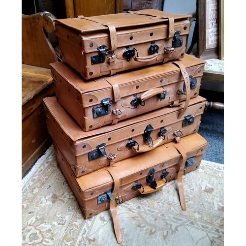 15 - Vintage Luggage - a matching graduated set of Giovanni leather suitcases; another larger leather sui... 