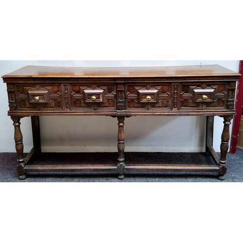 20 - A Charles II Revival oak block front dresser base, moulded rectangular top, the frieze fitted with t... 