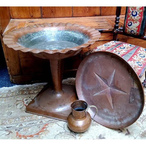 39 - An unusual Arts & Crafts period hammered copper pedestal fountain/urn, flared bowl with undulati... 