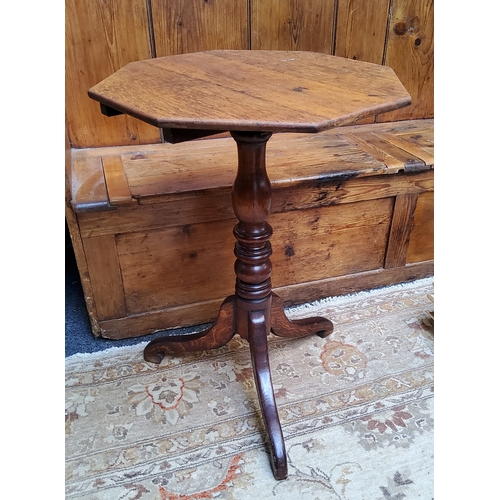 46 - A Victorian English oak octagonal wine table with turned column support raised on tripod of cabriole... 