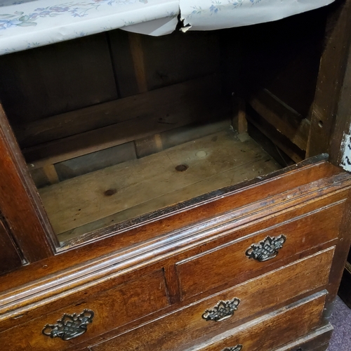 52 - A George III English oak housekeepers cupboard c.1780