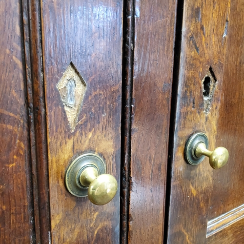 52 - A George III English oak housekeepers cupboard c.1780