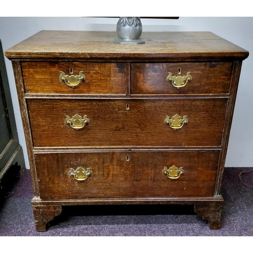 53 - A George III English oak bachelor's chest of twoshort above two long drawers, bracket feet c.1800 77... 