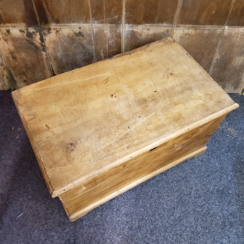 154 - An early 20th century rectangular pine blanket box, 46cm high, 84cm wide