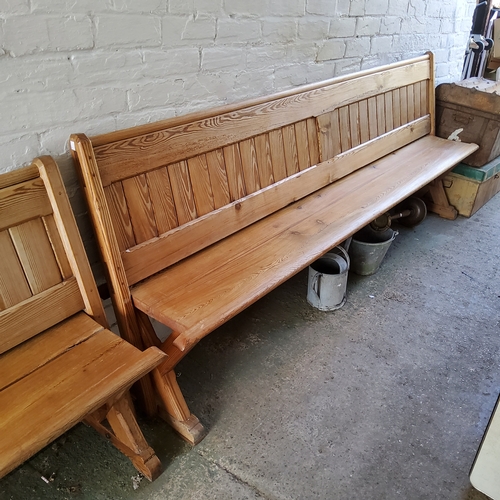 160 - A Victorian pitch pine church pew/ tram seat, reversible slatted back, 240cm long, c,1860. Note... 