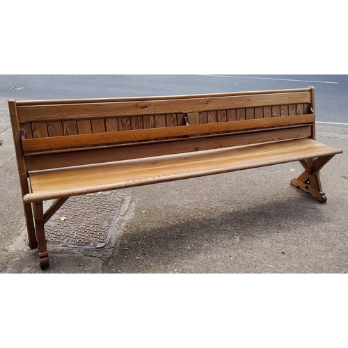 161 - A Victorian pitch pine church pew / tram seat, slatted back, 240cm long, c,1860