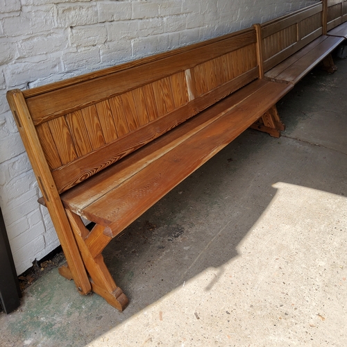 162 - A Victorian pitch pine church pew, slatted back, 240cm long, c,1860