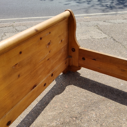 169 - A Farmhouse pine double sleigh bed