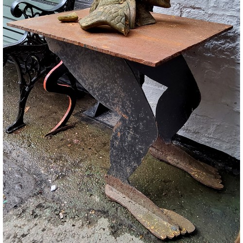 177 - A highly unusual 'folk art' or occult interest cast iron table, the supports as the legs and forked ... 