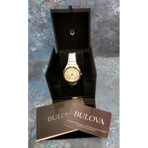 233 - A Bulova Curv stainless steel watch, 262 khz quartz six jewel movement, rose gold plated bezel, silv... 