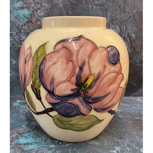 283 - A Moorcroft Magnolia pattern ovoid vase, 19cm, signed, puce paper label to the late Queen Mary c.194... 