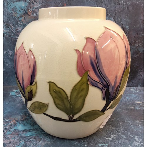 283 - A Moorcroft Magnolia pattern ovoid vase, 19cm, signed, puce paper label to the late Queen Mary c.194... 