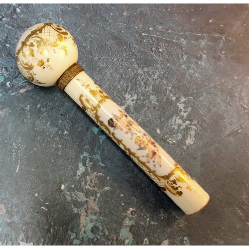 287 - A Victorian porcelain parasol handle, decorated with sheubs within a gilt cartouche, on a white grou... 