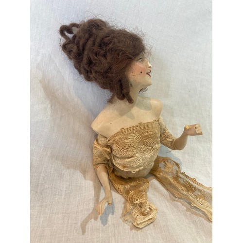 358 - An early 20th century German Boudoir half doll, brown wig, open mouth, 15cm high, triangle mark