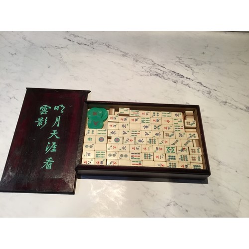 90 - A Chinese bone and bamboo mahjong set, boxed